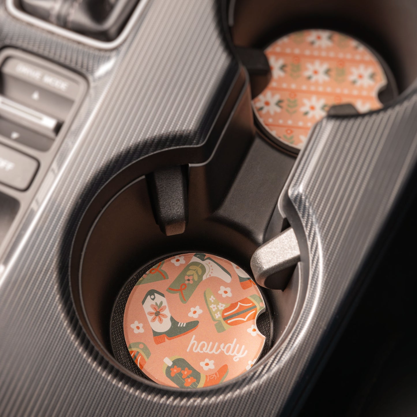 Boots Car Coasters in cup holders.