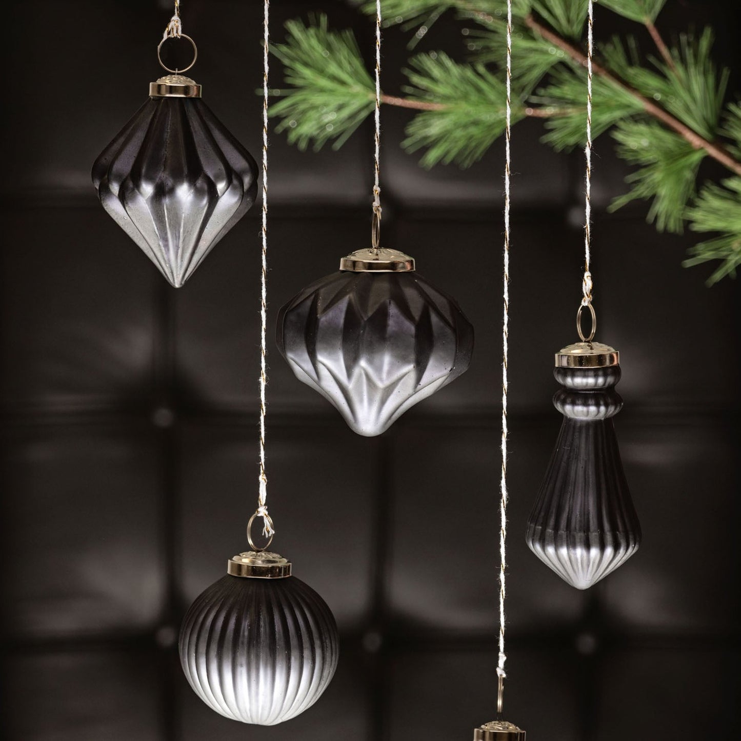 Gunmetal Ornaments with black background.