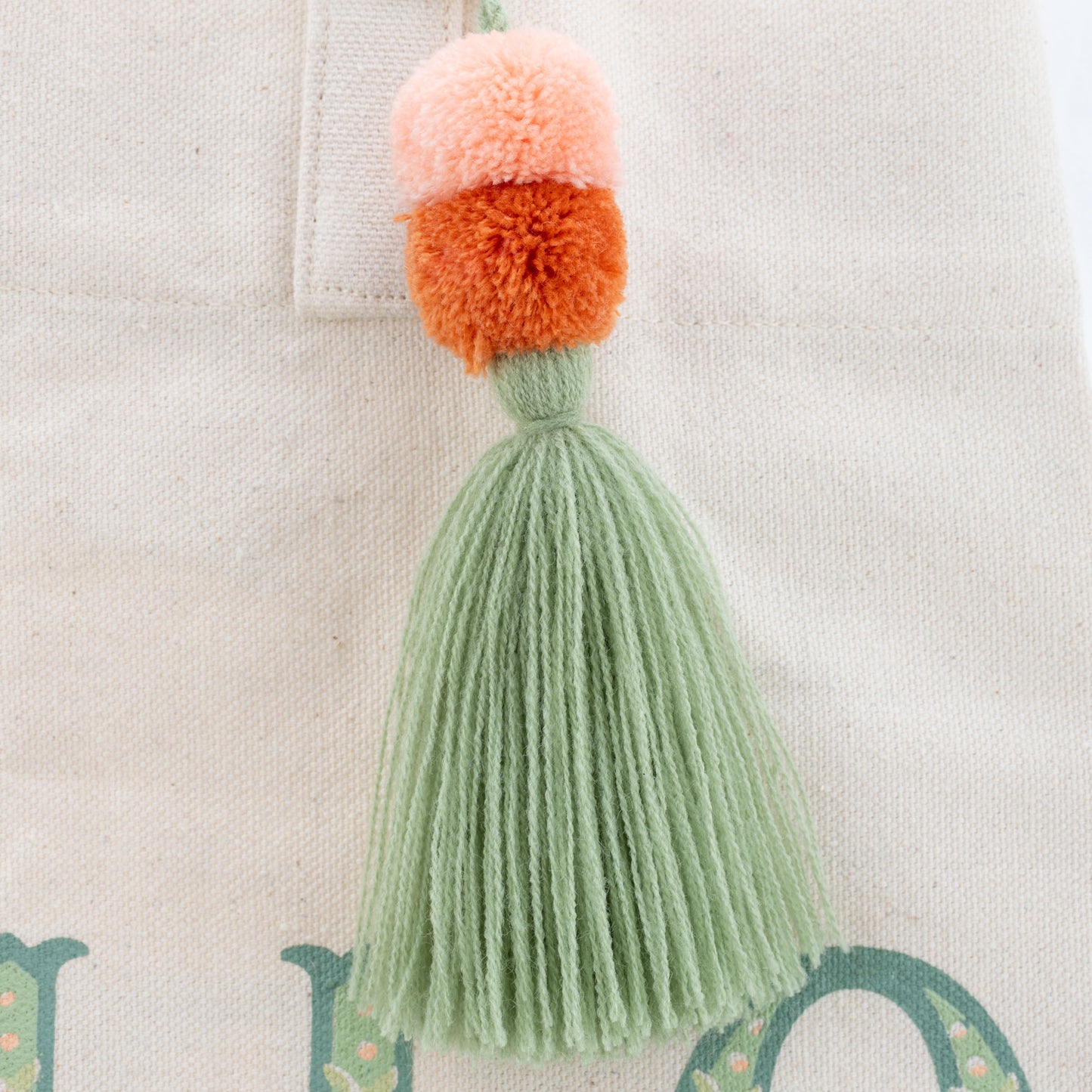 Hello Sunshine Canvas Tote Bag close-up tassel view.