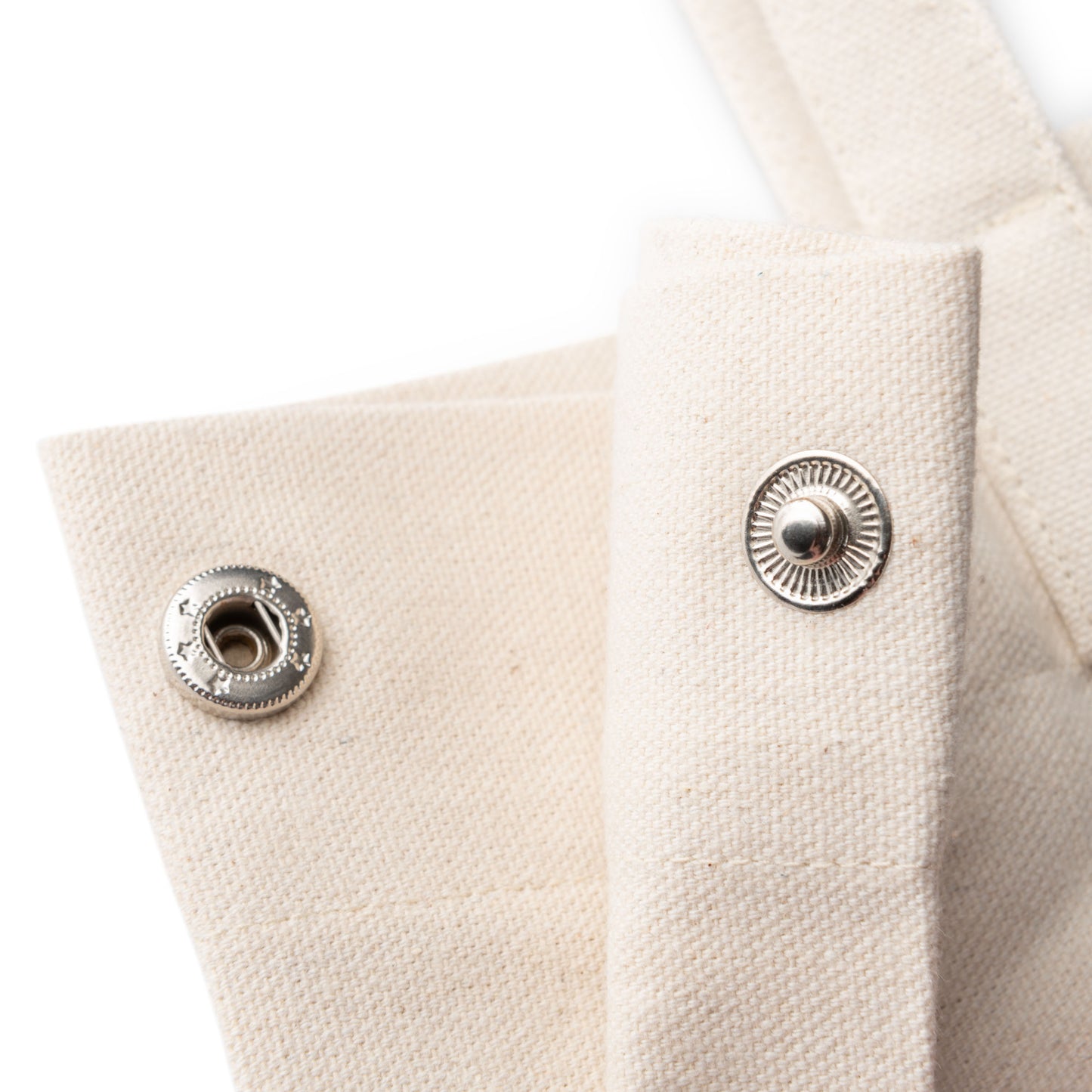 Hello Sunshine Canvas Tote Bag button close-up view.