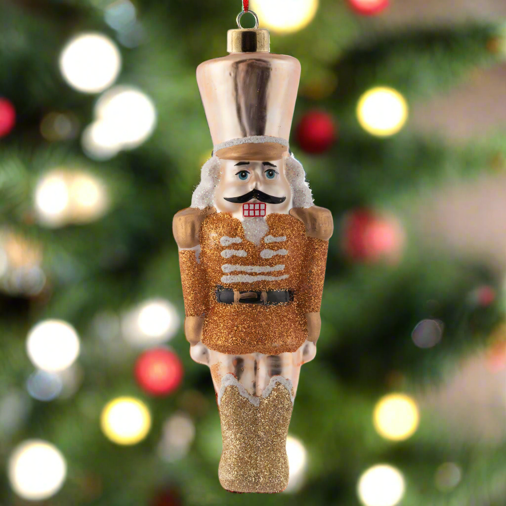 Gold Nutcracker Mercury Glass Ornament with holiday lighting