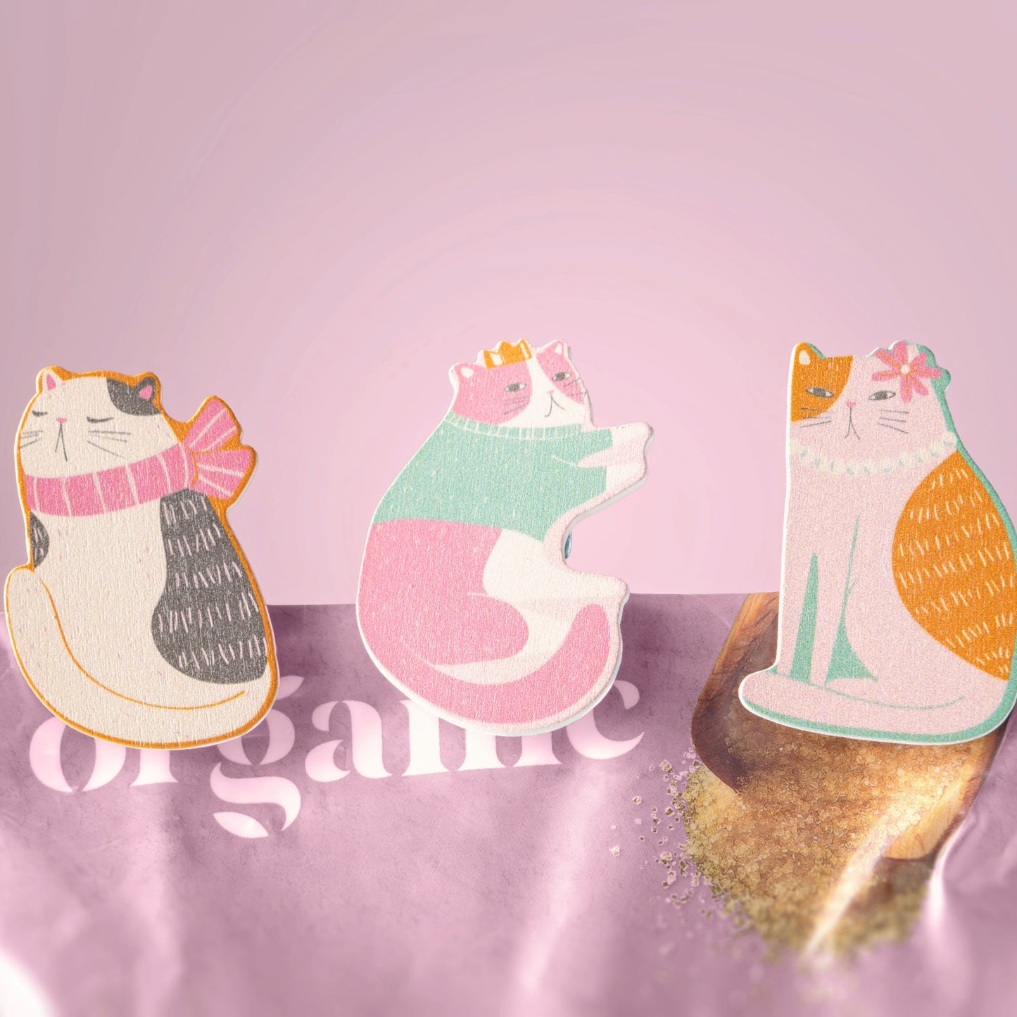 Cats Shaped Magnetic Chip Clips clipped on a bag with a pink background.