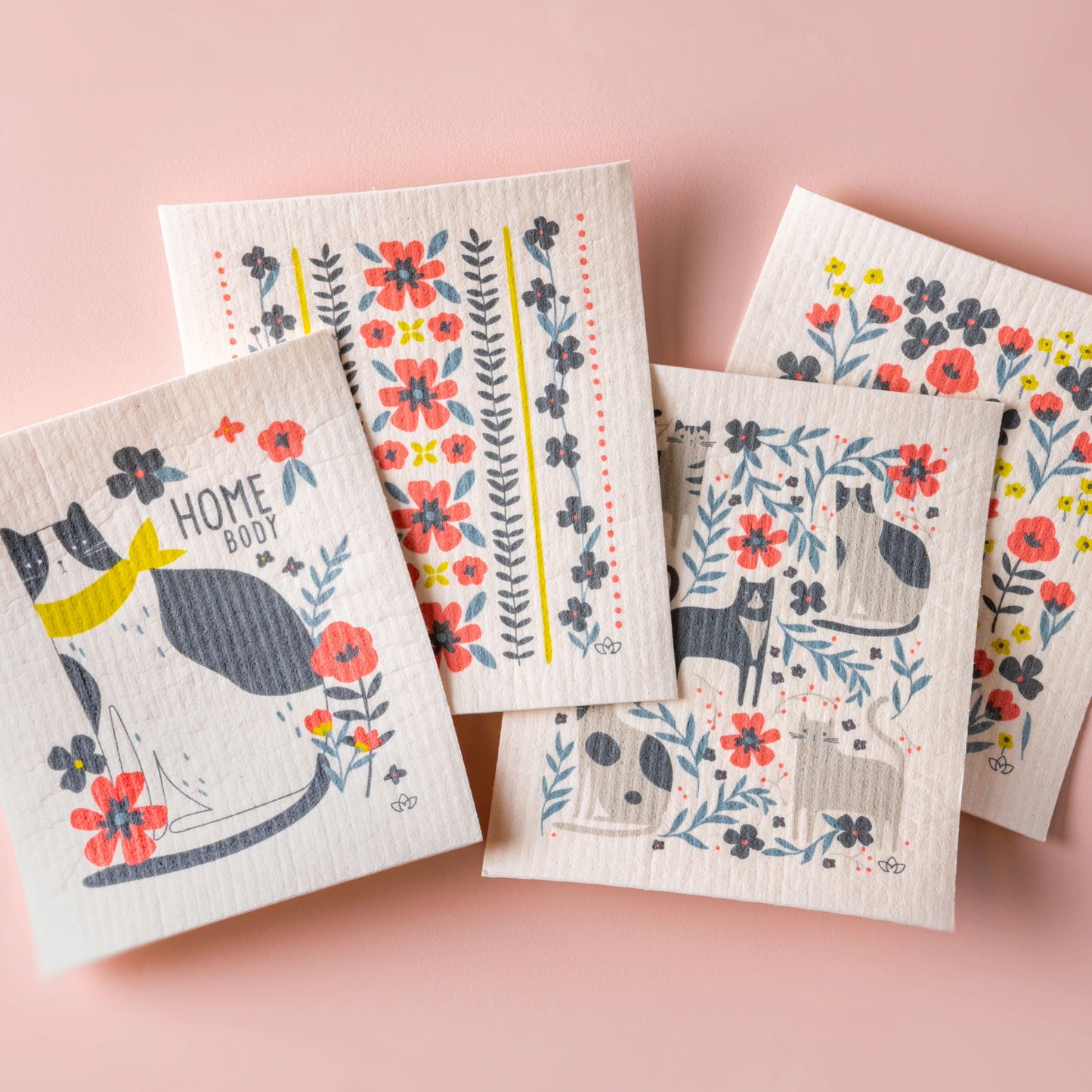 Cat Swedish Dishcloth on a pink background.