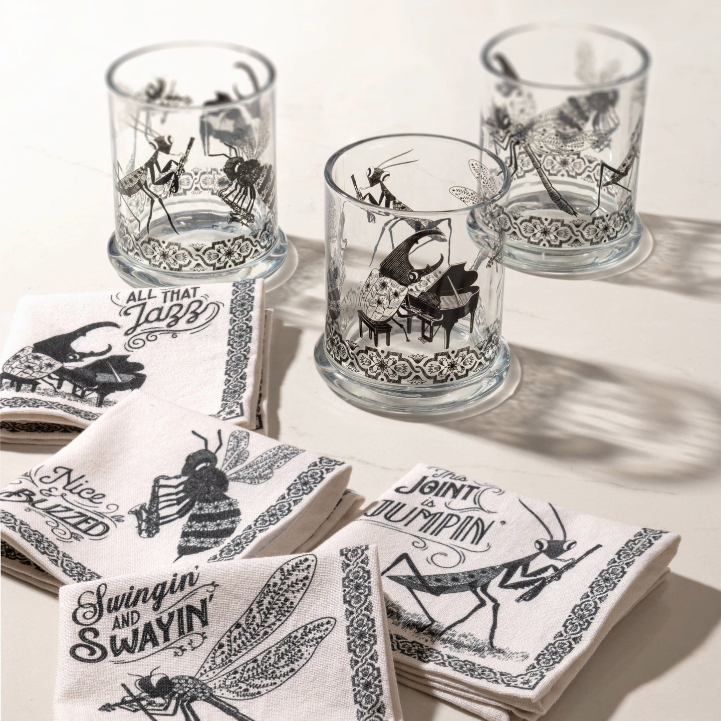 Bug Band DOF and napkins on a white table.