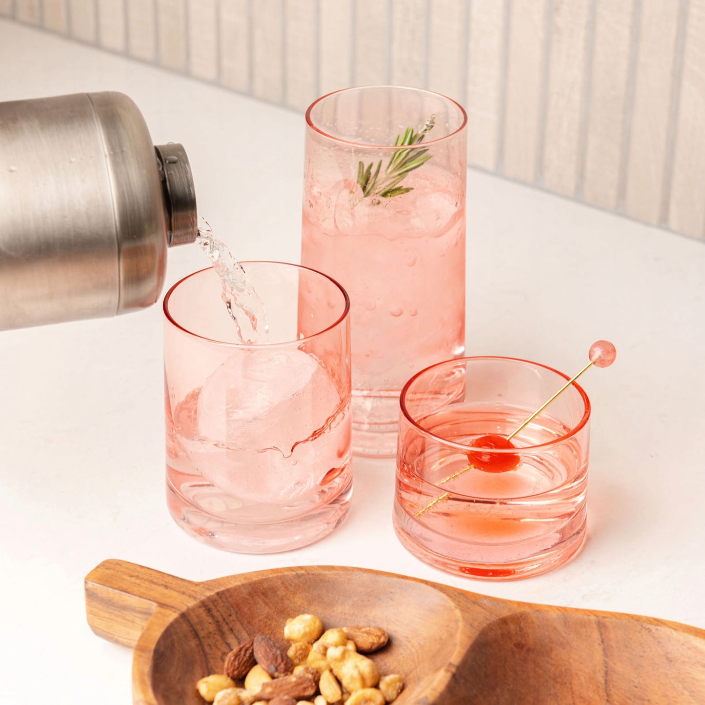 Blush Mid Century Cooler Glasses on a table.