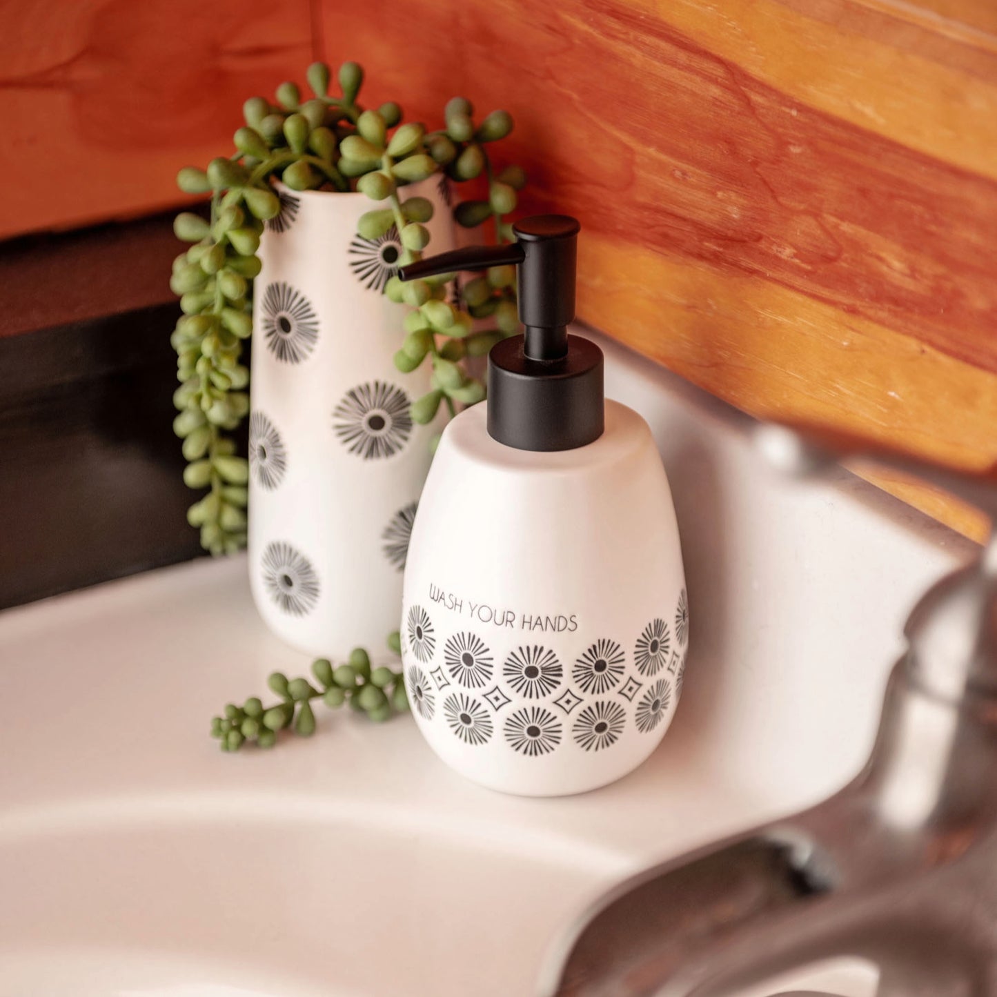 Large Milo Bud Vase on a sink.