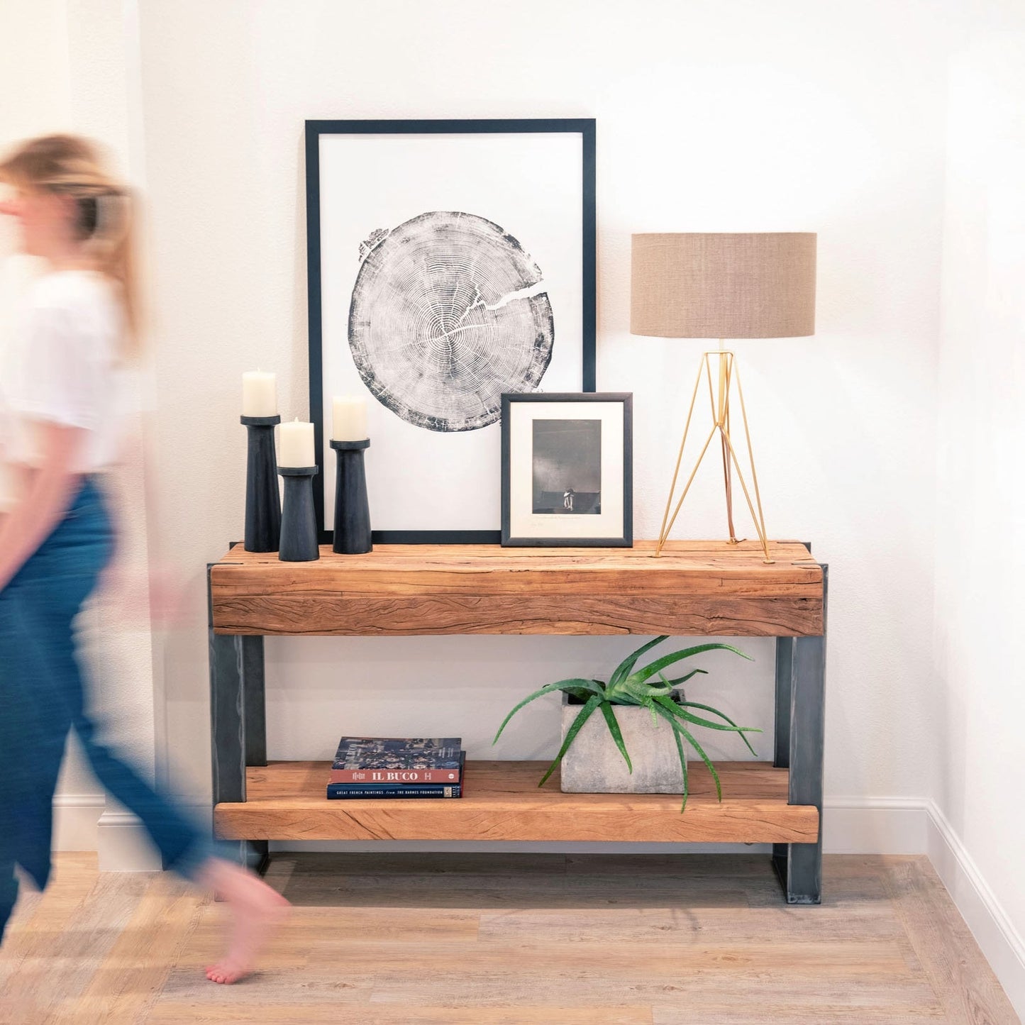 Brass Tripod Table Lamp on a side table with other décor.