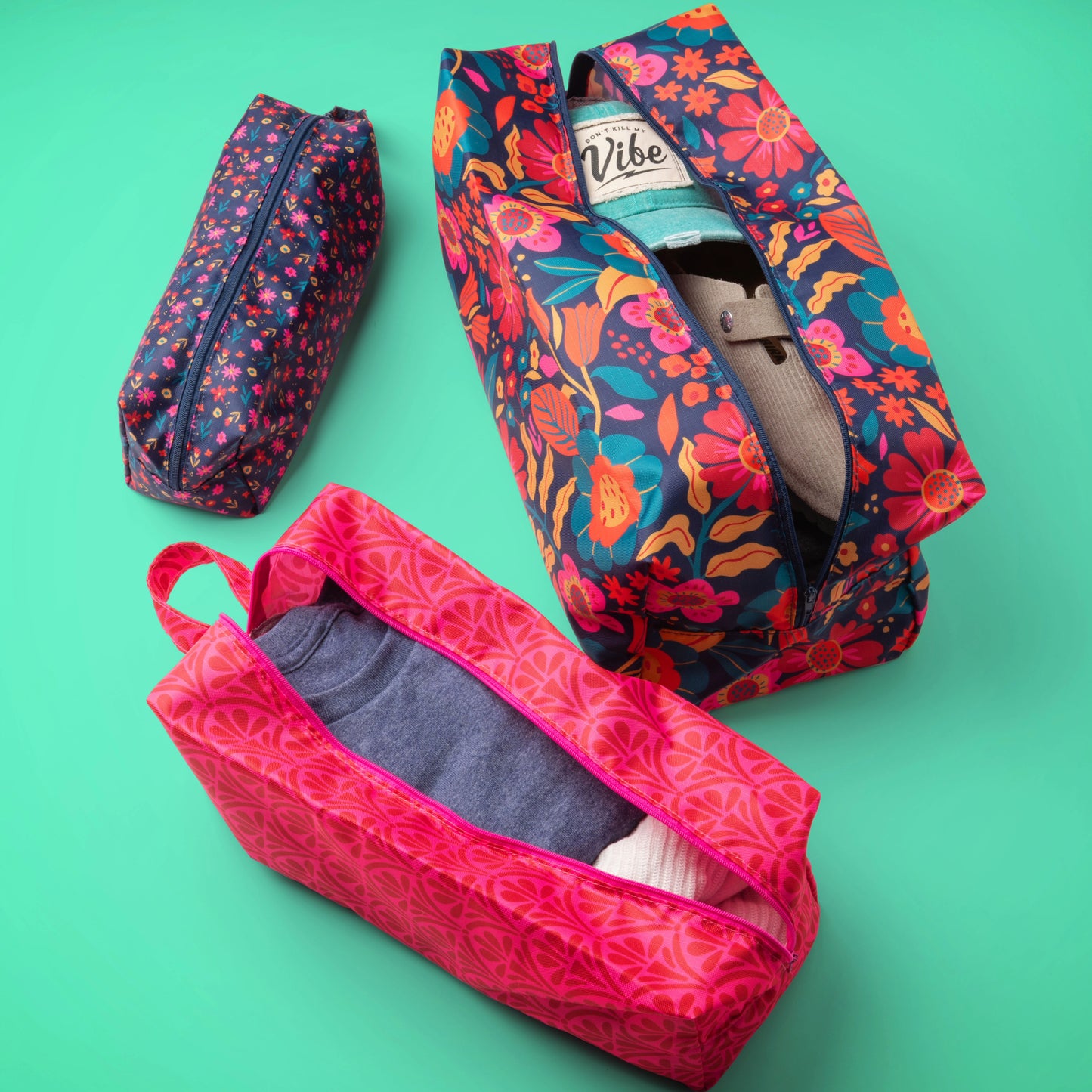 Retro Floral Travel Cubes against a green background.