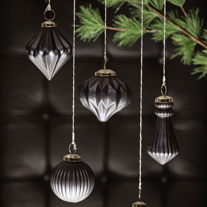 Gunmetal Ornaments with black background. 