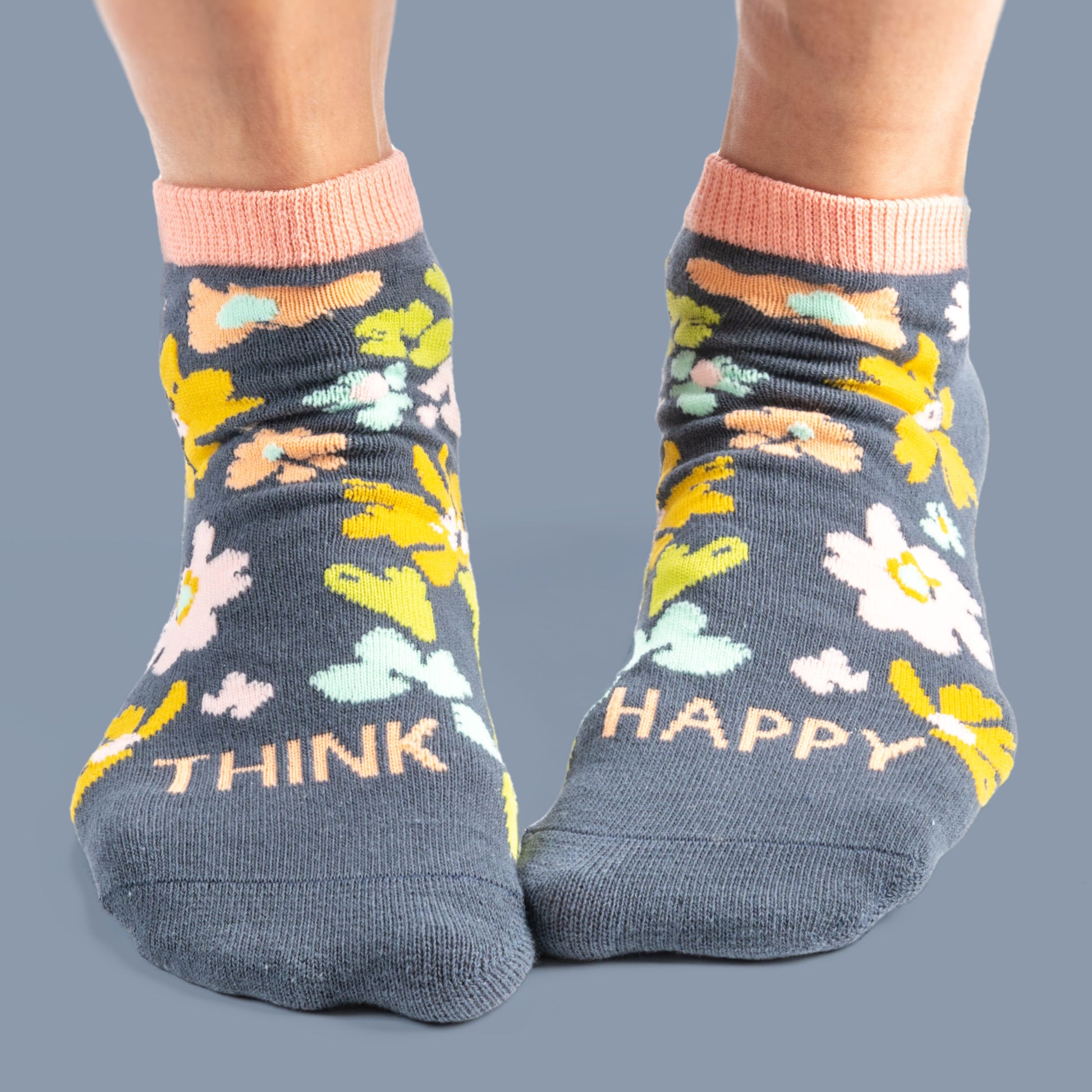 Navy Floral Ankle Socks against a blue background.