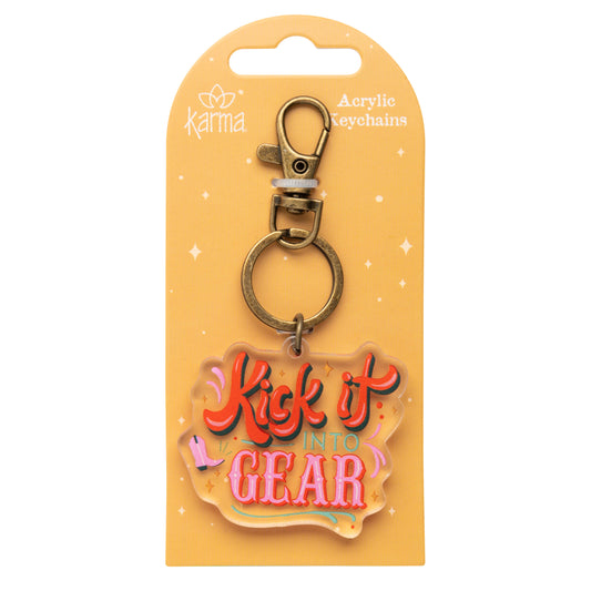 Kick It Acrylic Keychain packaged view. 