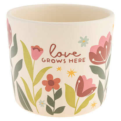 Love Grows Here Ceramic Planters large planter view. 