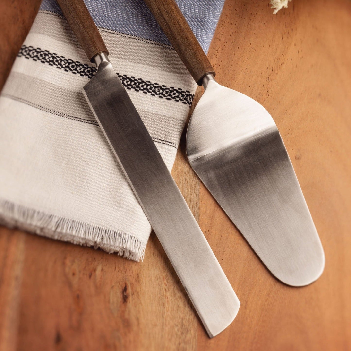 Wood Cake Servers on a lisbon tea towel. 
