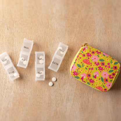 Mushroom Travel Pill Case with box on a wooden table. 