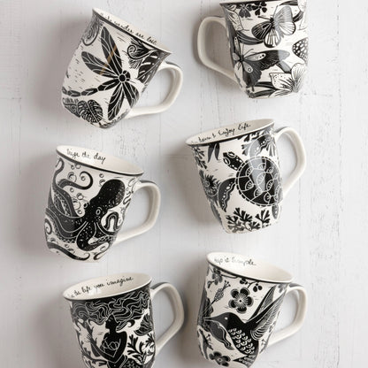 Boho mugs against a white background. 