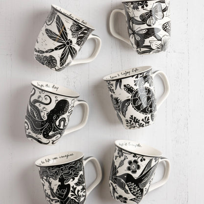Boho mugs against a white background. 