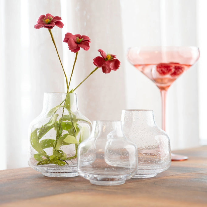 Clear Bubble Glass Vase on a table. 