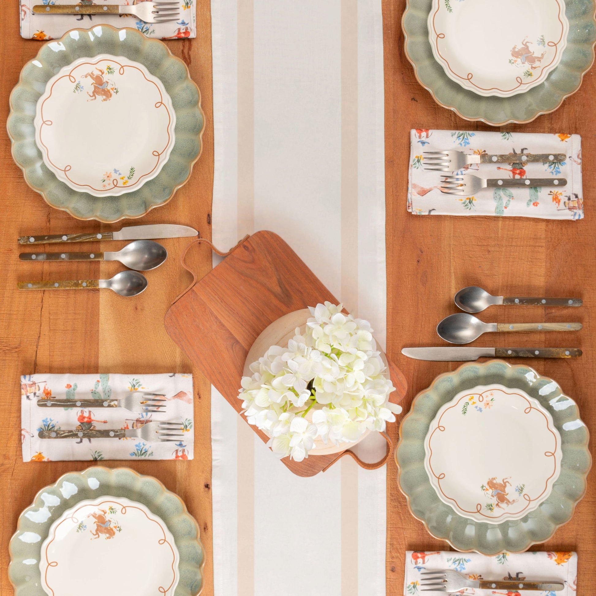 Jade Scallop Dinner Plate, vintage cowboy tea towels and plates, as table setting. 
