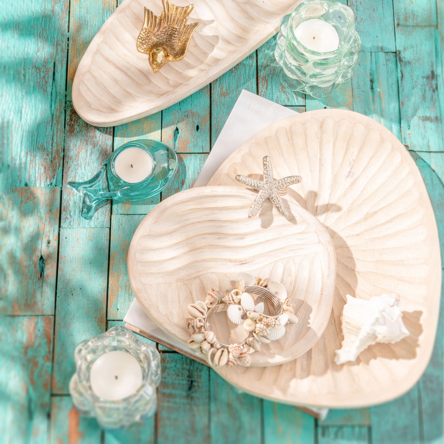 White Wash Trays on a blue table. 