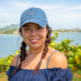 Woman wearing butterfly dad hat